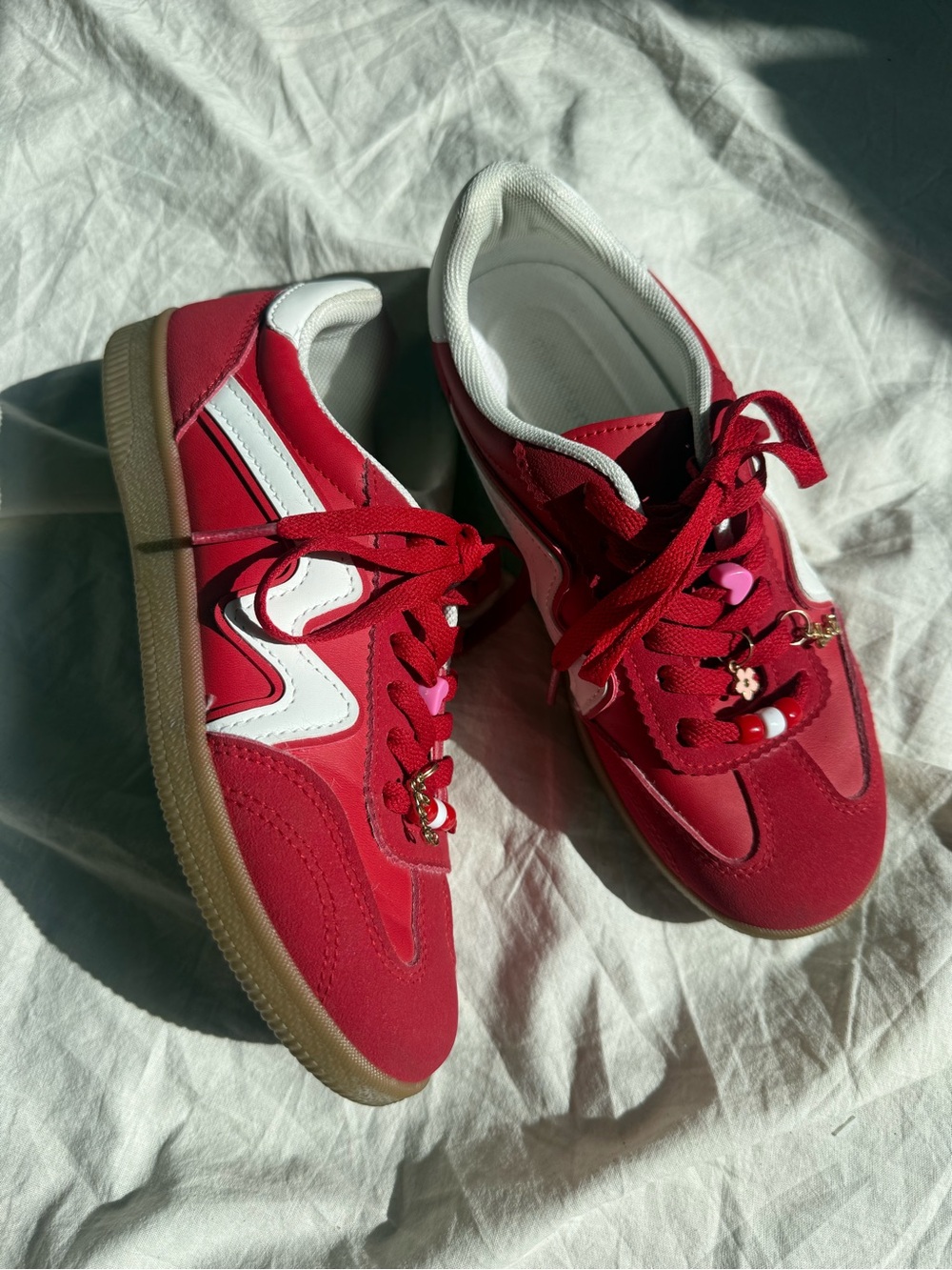 Madden Girl Red and White Women’s Sneakers with Charms